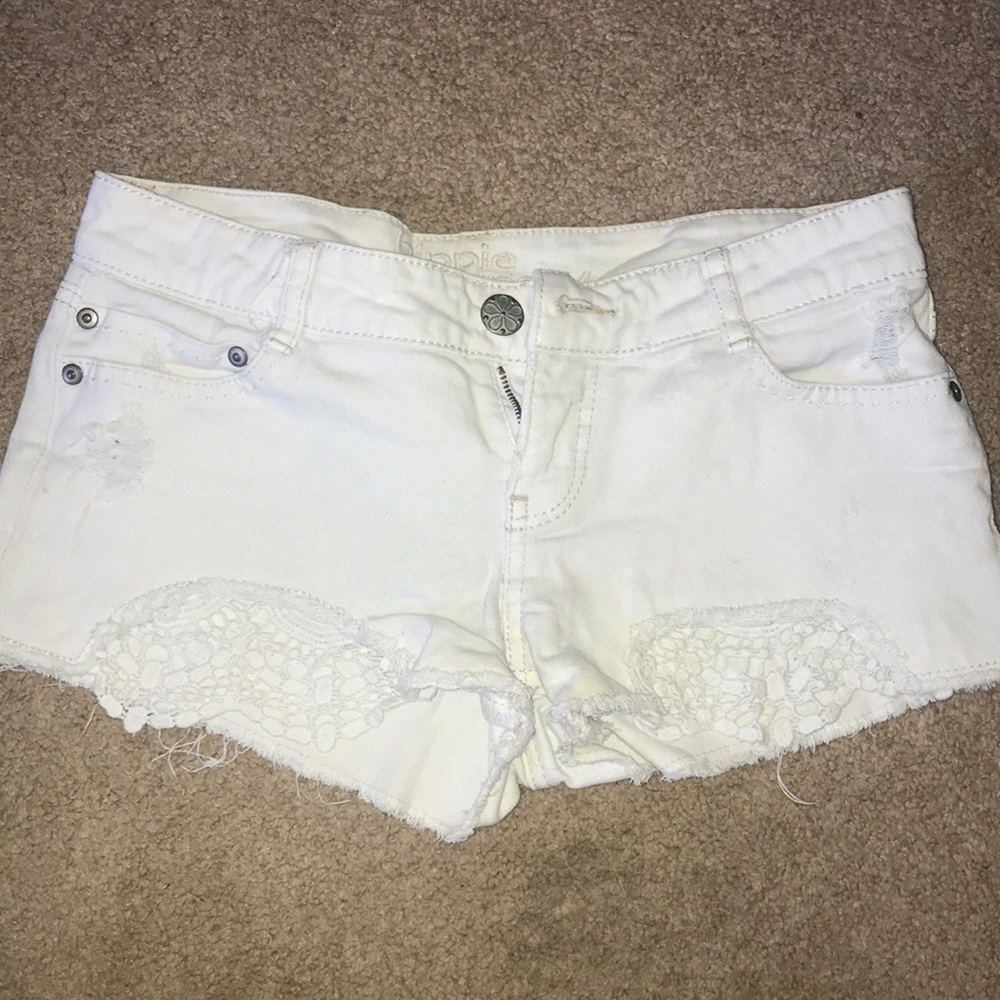 White cutoff shorts